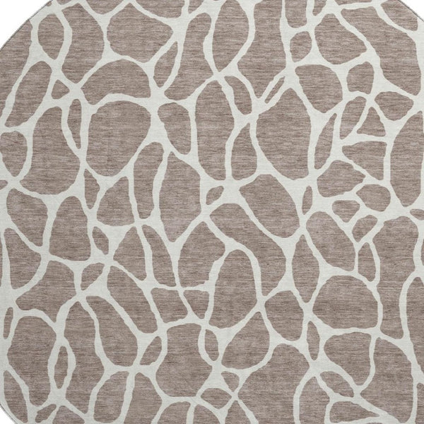 HomeRoots 8' Taupe and Ivory Geometric Round Rug - Washable, UV-Protected, Durable Design for Modern Spaces 680442