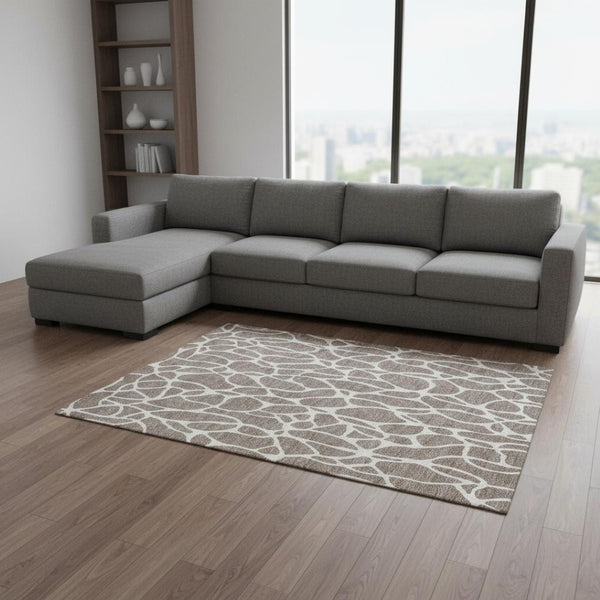 HomeRoots 10' X 14' Taupe & Ivory Geometric Area Rug – Durable, Washable, UV-Protected for Stylish Living Spaces 680445