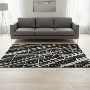 HomeRoots 5' X 8' Striped Area Rug in Black, Gold & Ivory - Durable, Washable, UV-Protected for Modern Homes 680465