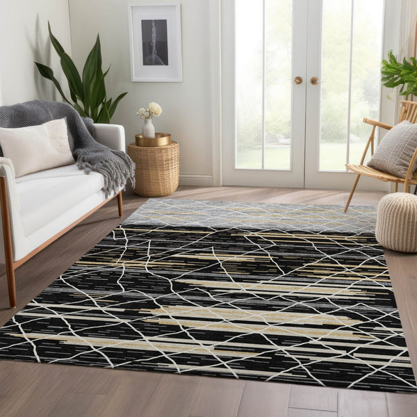 HomeRoots 9' X 12' Striped Area Rug in Black, Gold & Ivory - Washable, UV Protected, Stain Resistant Design 680468