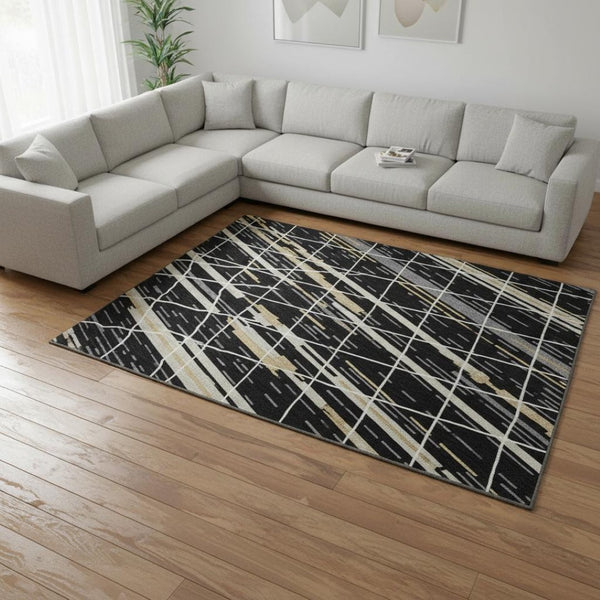 HomeRoots 10' X 14' Striped Washable Area Rug in Black, Gold & Ivory - UV Protected, Stain Resistant, Durable Design 680469