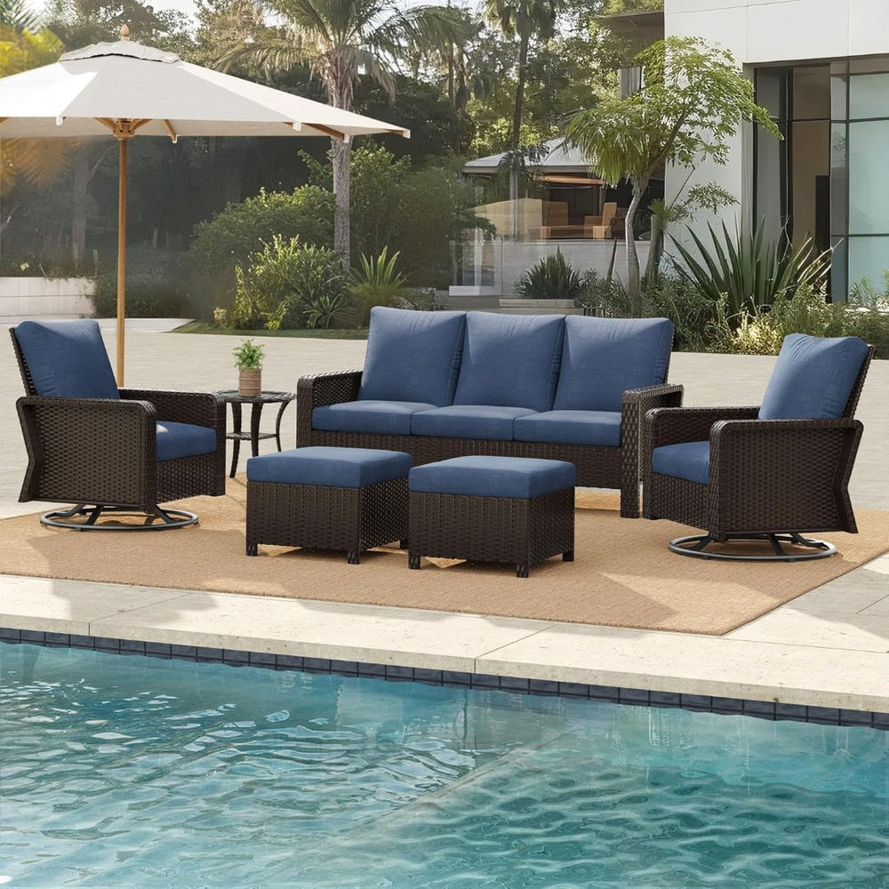 English Elm Tl Seven Piece Outdoor Pe Rattan Patio Set with Swivel Chairs Footstools and Side Table T5925S00010
