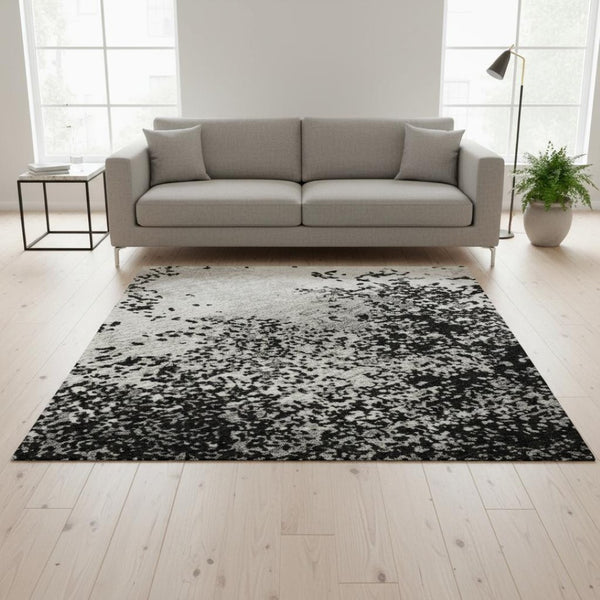 HomeRoots 5' X 8' Abstract Washable Area Rug in Black, Gray & Silver - UV Protected, Durable & Easy-Care Design 680611