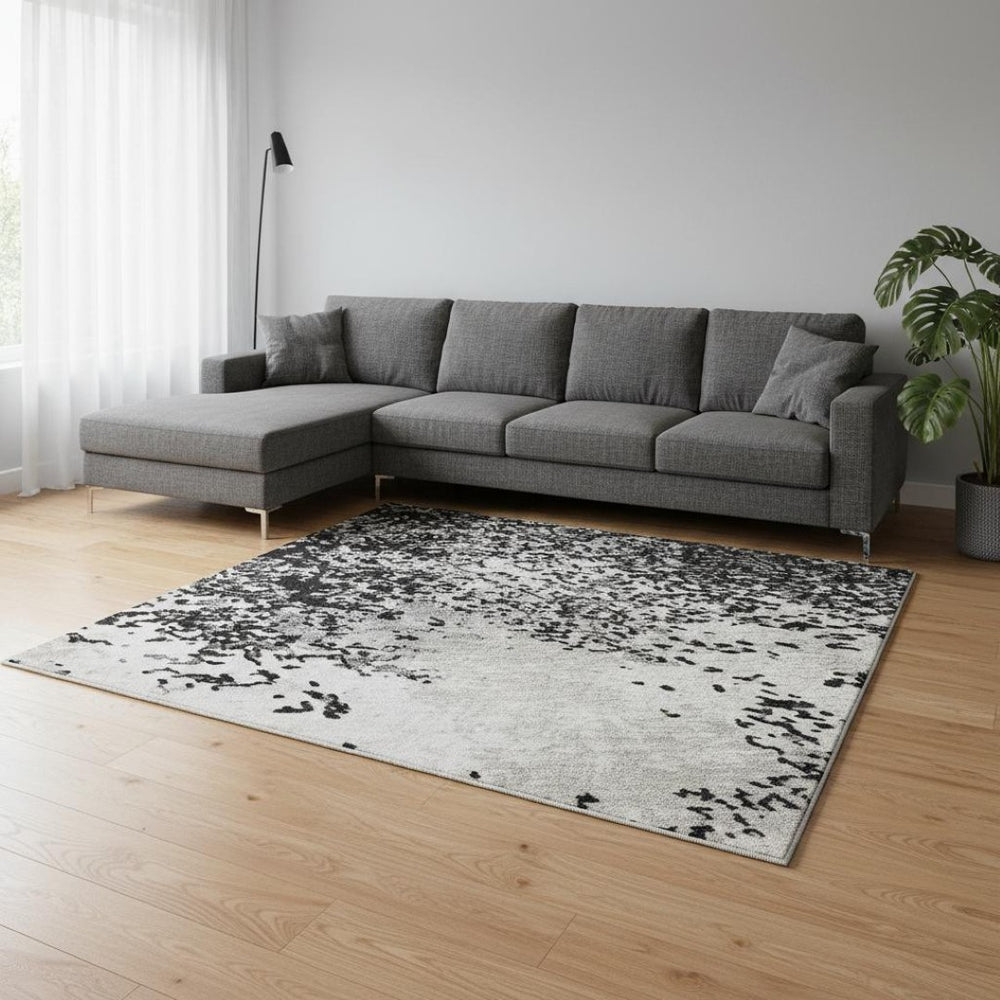 HomeRoots 8' X 10' Modern Abstract Washable Area Rug in Black, Gray & Silver with UV Protection for High Traffic 680613