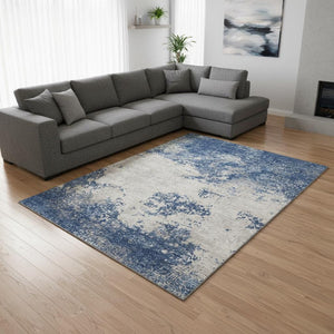 HomeRoots 9' X 12' Navy Blue & Ivory Abstract Washable Area Rug - Stain Resistant & UV Protected for Durability 680662
