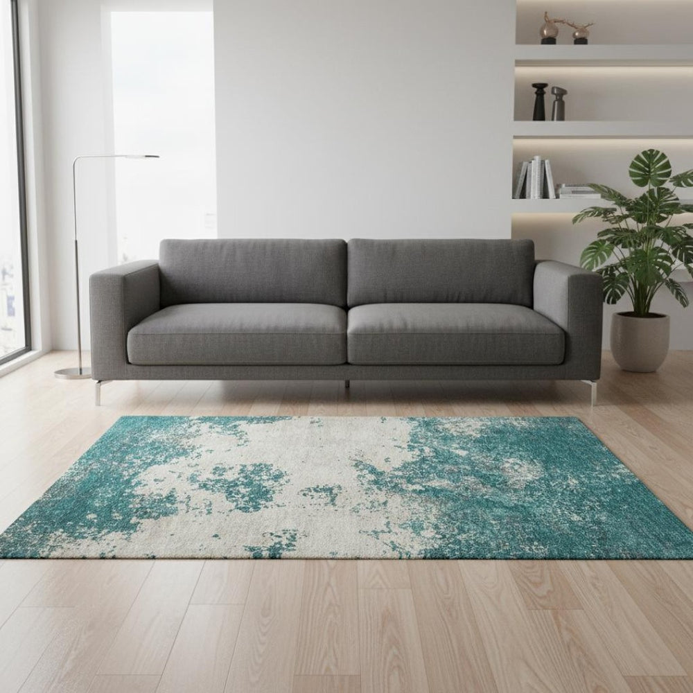 HomeRoots 5' X 8' Teal and Ivory Abstract Area Rug - Washable, UV-Protected, Stylish for High-Traffic Spaces 680671