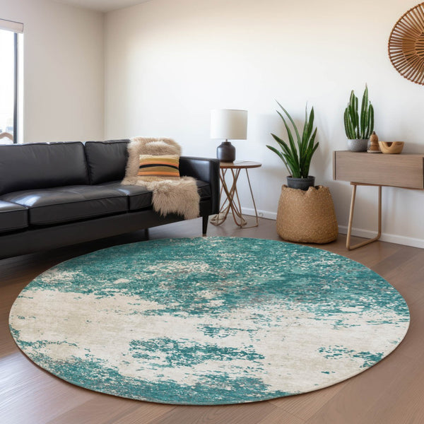 HomeRoots 8' Teal and Ivory Abstract Round Rug - Durable, Washable, UV-Protected for Modern Living Spaces 680672