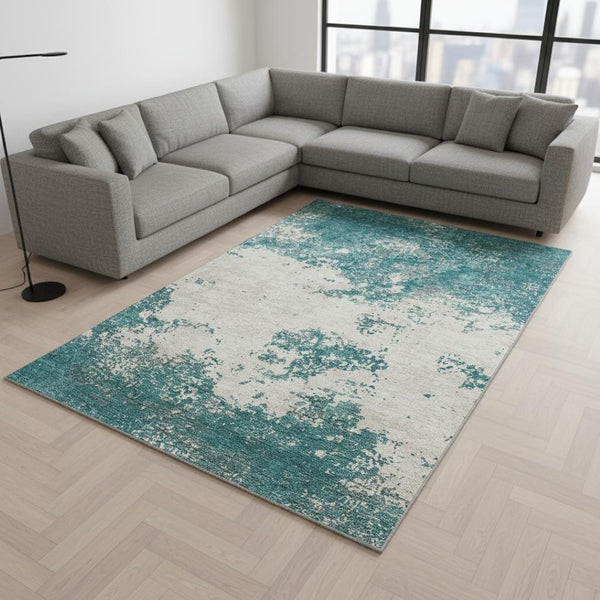 HomeRoots 10' X 14' Teal and Ivory Abstract Area Rug – Durable, Washable, UV-Protected for Modern Homes! 680675