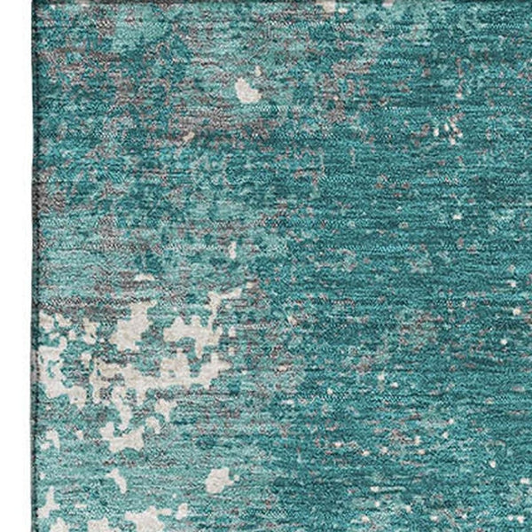 HomeRoots 10' X 14' Teal and Ivory Abstract Area Rug – Durable, Washable, UV-Protected for Modern Homes! 680675