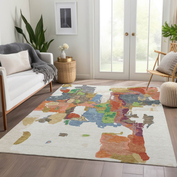 HomeRoots 10' Modern Abstract Washable Area Rug in Ivory, Orange, Blue & Green - UV Protected & Durable Design 680735
