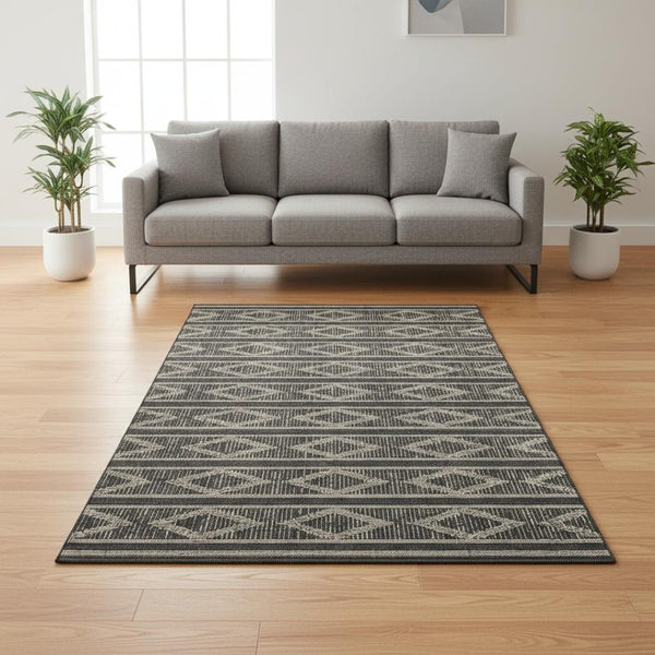 HomeRoots 5' X 8' Stylish Black And Taupe Geometric Washable Area Rug with UV Protection for Busy Homes 680755