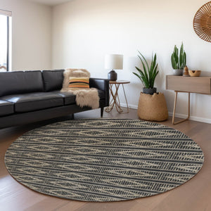HomeRoots 8' Black And Taupe Geometric Round Rug - Washable, UV-Protected, Durable Style for Busy Homes 680756