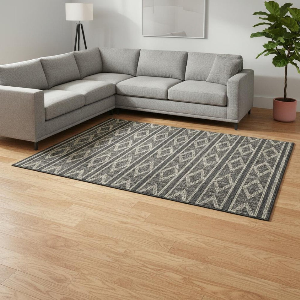 HomeRoots 8' X 10' Washable Black and Taupe Geometric Area Rug with UV Protection for Modern Homes & Spaces 680757