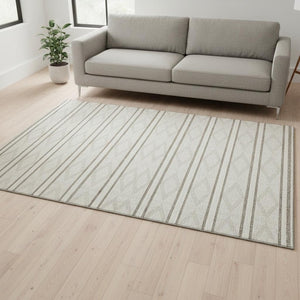 HomeRoots 5' X 8' Ivory & Taupe Geometric Washable Area Rug with UV Protection for Stylish Family Living 680785