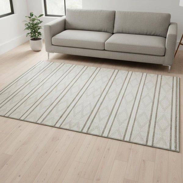 HomeRoots 5' X 8' Ivory & Taupe Geometric Washable Area Rug with UV Protection for Stylish Family Living 680785