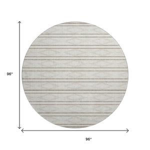 HomeRoots 8' Ivory and Taupe Geometric Round Rug - Washable, UV Protected, Family-Friendly for High-Traffic Spaces 680786