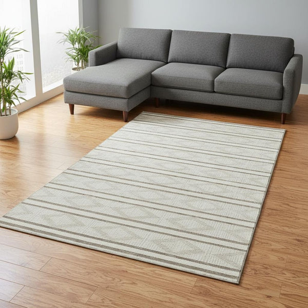 HomeRoots 10' X 14' Ivory And Taupe Geometric Area Rug – Washable, Durable, UV-Protected Design for Families 680789