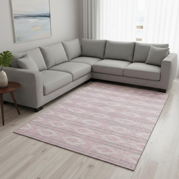 HomeRoots 10' Pink and Ivory Geometric Washable Area Rug - Durable, UV-Protected, Perfect for High-Traffic Spaces 680801