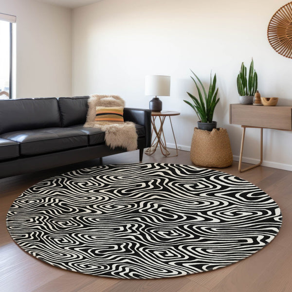 HomeRoots 8' Black And Ivory Abstract Round Rug - Washable, UV-Protected, Stain Resistant for Stylish Durability 680840