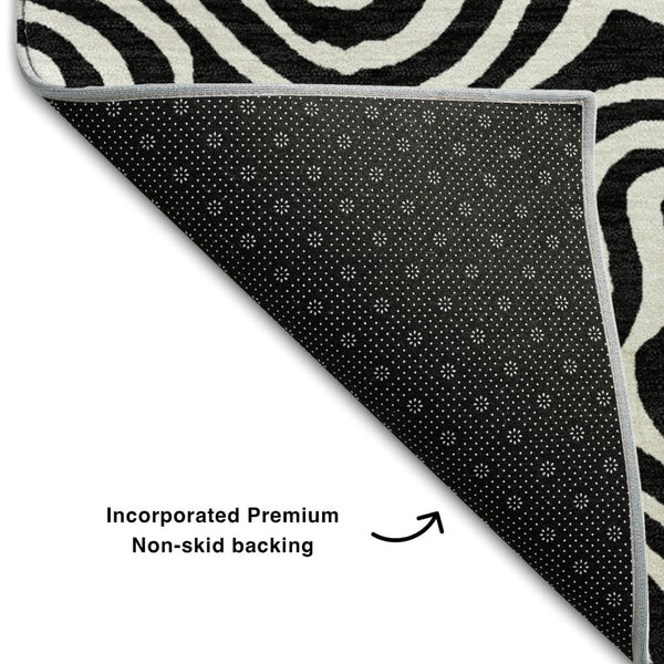HomeRoots 8' Black And Ivory Abstract Round Rug - Washable, UV-Protected, Stain Resistant for Stylish Durability 680840