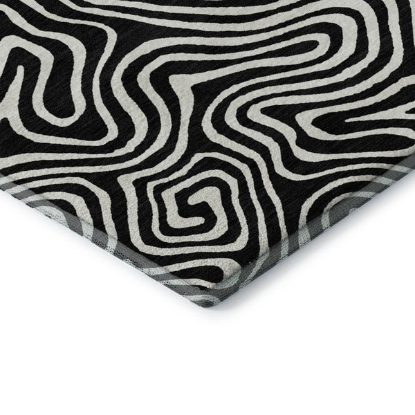 HomeRoots 8' Black And Ivory Abstract Round Rug - Washable, UV-Protected, Stain Resistant for Stylish Durability 680840