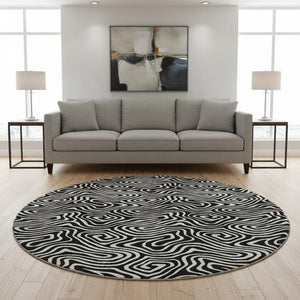 HomeRoots 8' Black And Ivory Abstract Round Rug - Washable, UV-Protected, Stain Resistant for Stylish Durability 680840