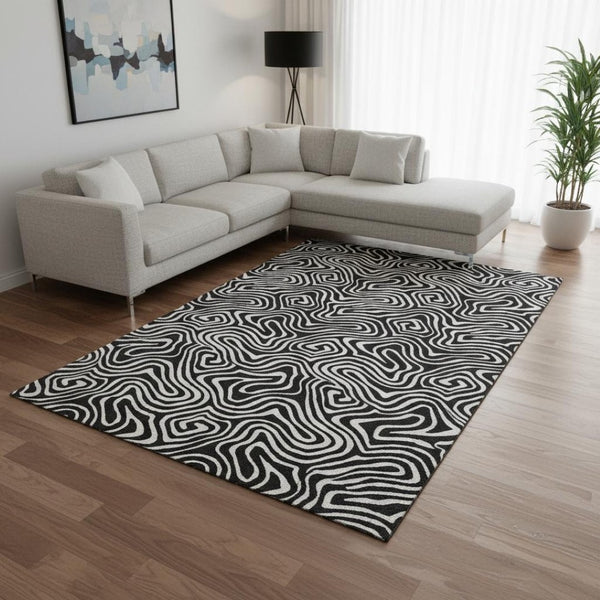 HomeRoots 10' X 14' Black And Ivory Abstract Area Rug - Durable, Washable, UV-Protected for Busy Homes 680843