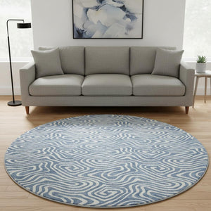 HomeRoots 8' Chic Denim Blue & Ivory Abstract Washable Round Rug - Stain-Resistant, UV Protected for All Spaces 680858