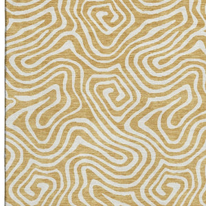 HomeRoots 5' X 8' Gold and Ivory Abstract Area Rug - Stain Resistant, Washable, UV Protected for High-Traffic Spaces 680863
