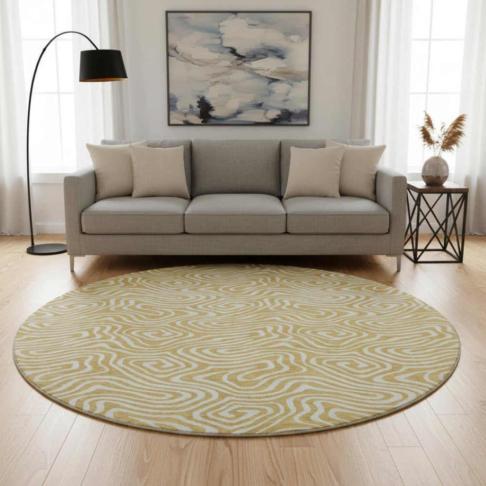HomeRoots 8' Gold And Ivory Abstract Round Rug - Washable, Stain-Resistant, UV Protected for Modern Spaces 680864