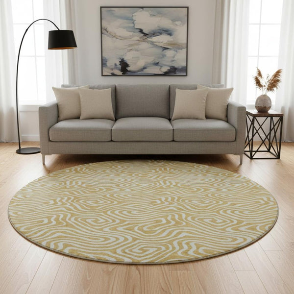 HomeRoots 8' Gold And Ivory Abstract Round Rug - Washable, Stain-Resistant, UV Protected for Modern Spaces 680864