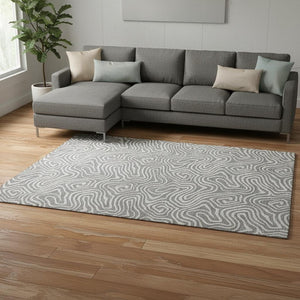HomeRoots 10' Gray and Ivory Abstract Area Rug - Washable, UV Protected, Durable Design for Modern Spaces 680873