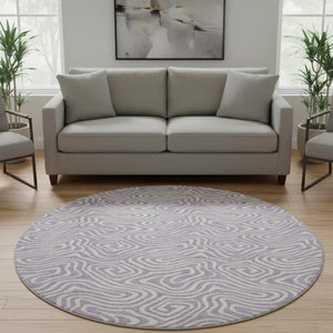 HomeRoots 8' Stylish Washable Round Rug in Lavender & Ivory - Abstract Design with UV Protection & Durability 680882