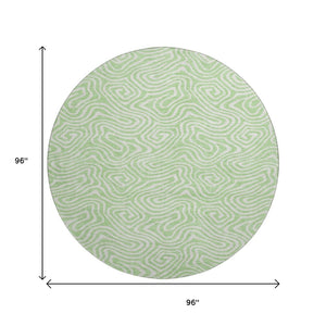 HomeRoots 8' Mint Green and Ivory Abstract Round Rug – Washable, UV-Protected, Stylish for High-Traffic Areas 680888
