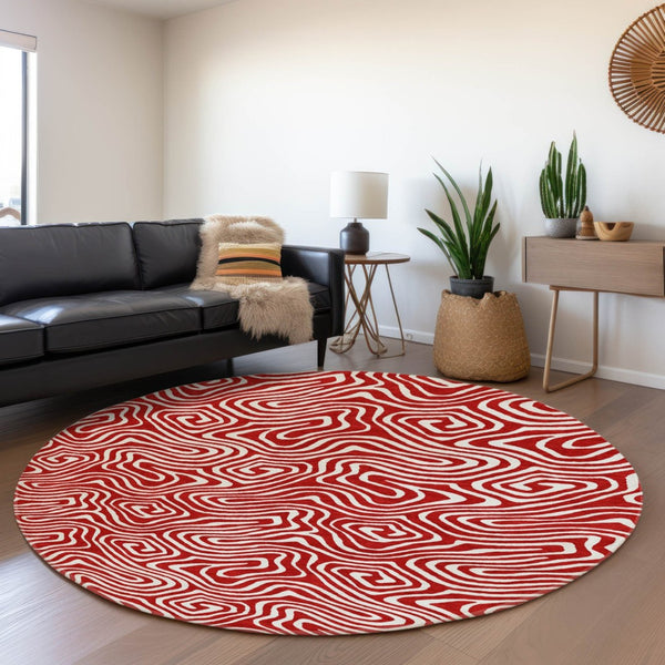 HomeRoots 8' Red And Ivory Abstract Round Rug - Washable, UV-Protected, Perfect for Active Homes & Patios 680900