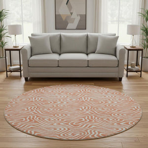 HomeRoots 8' Salmon and Ivory Abstract Round Rug - Washable, UV Protected, Durable, and Stylish Home Accent 680906