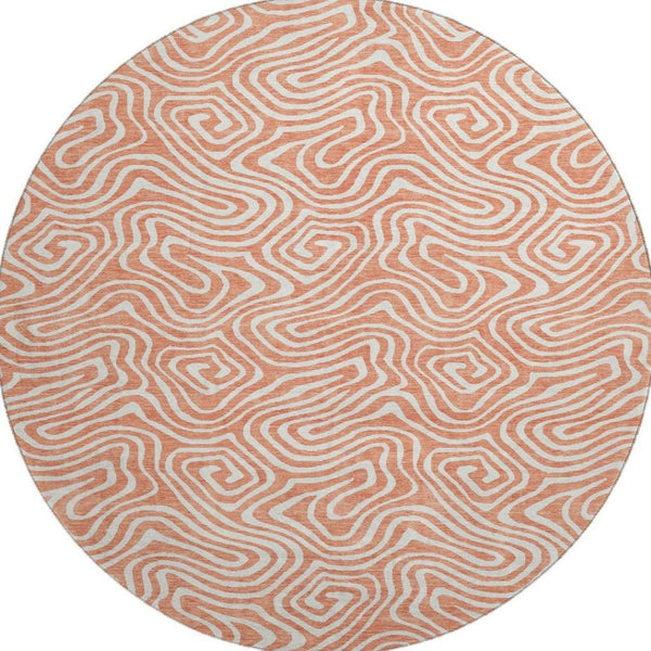 HomeRoots 8' Salmon and Ivory Abstract Round Rug - Washable, UV Protected, Durable, and Stylish Home Accent 680906
