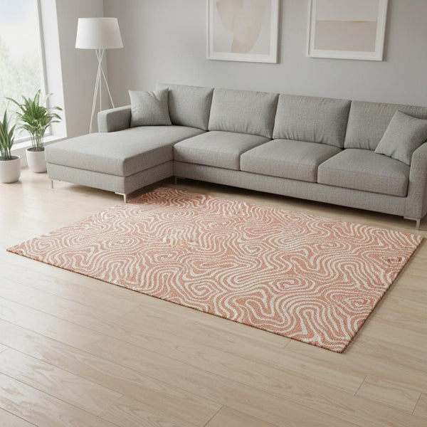 HomeRoots 8' X 10' Salmon & Ivory Abstract Area Rug - Durable, Washable, UV Protected for Everyday Living 680907