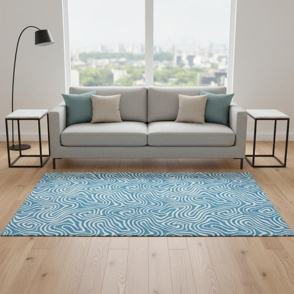 HomeRoots 5' X 8' Teal and Ivory Abstract Area Rug - Stylish, Washable, UV-Protected for Modern Living Spaces 680911