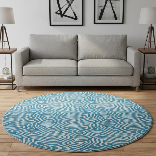 HomeRoots 8' Teal And Ivory Abstract Round Rug - Stylish, Washable, UV Protected for Modern Living Spaces 680912