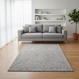 HomeRoots 5' X 8' Taupe and Ivory Abstract Area Rug - Durable, Washable, Pet-Friendly with UV Protection 680917