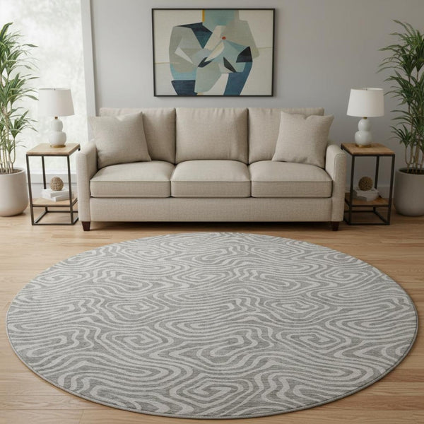 HomeRoots 8' Taupe and Ivory Abstract Round Rug - Washable, UV Protected, Soft, Durable, Ideal for Busy Homes 680918