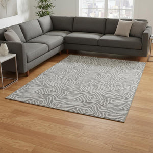 HomeRoots 8' X 10' Abstract Taupe & Ivory Area Rug - Washable, UV-Protected, Durable for Family Spaces! 680919