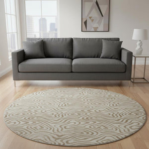 HomeRoots 8' Beige and Brown Abstract Round Rug - Washable, UV-Protected, Family-Friendly Design for Any Space 680930