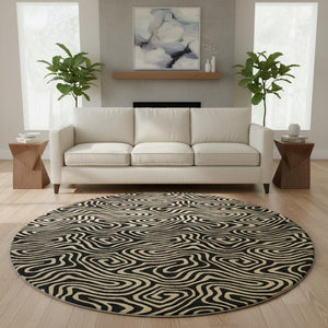 HomeRoots 8' Black And Gold Abstract Round Rug – Stylish, Washable, UV-Protected & Perfect for Modern Spaces! 680936