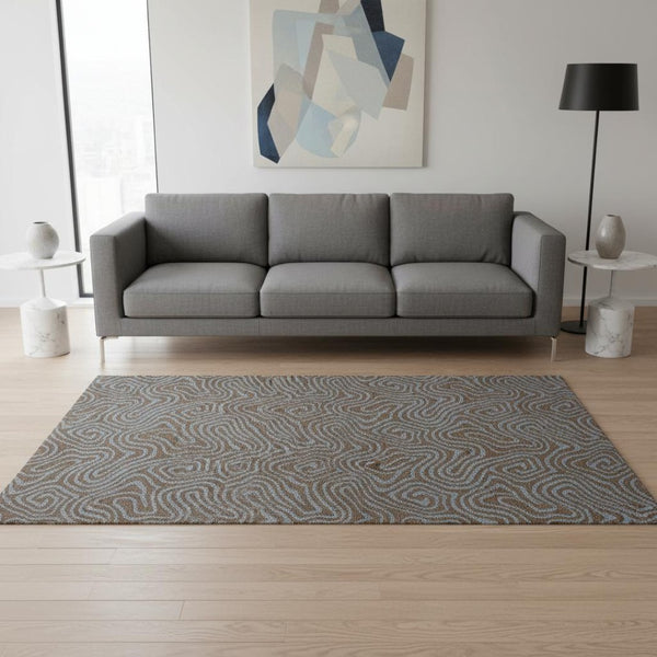 HomeRoots 5' X 8' Abstract Washable Area Rug in Brown and Sky Blue - UV Protected, Durable, and Stylish! 680941