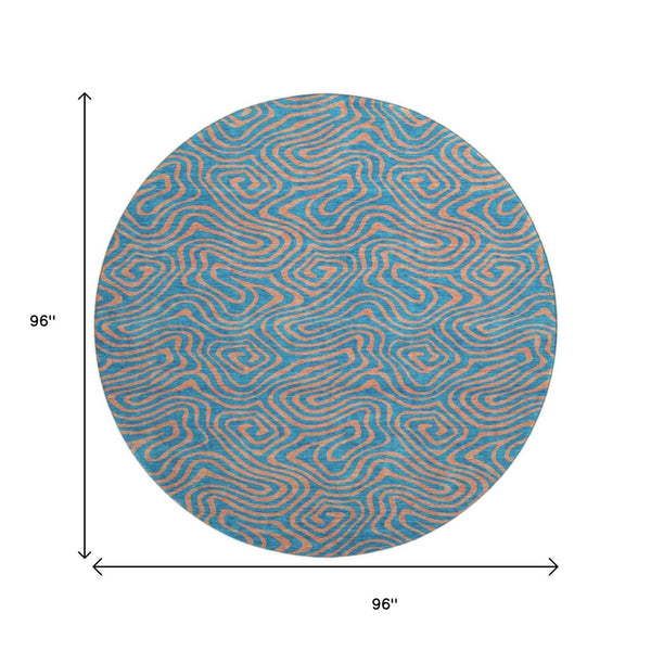 HomeRoots 8' Teal and Peach Abstract Washable Round Rug - Durable, UV-Protected, Perfect for Family Spaces! 680990