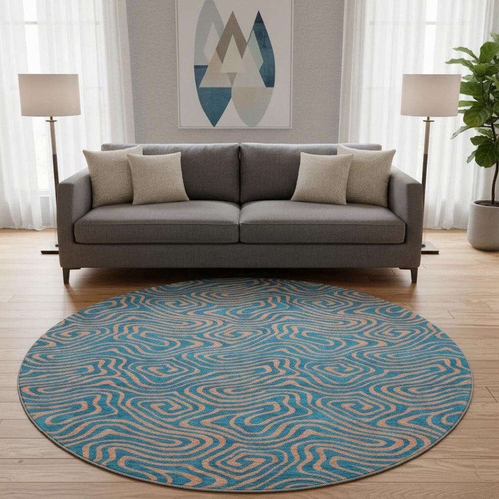 HomeRoots 8' Teal and Peach Abstract Washable Round Rug - Durable, UV-Protected, Perfect for Family Spaces! 680990