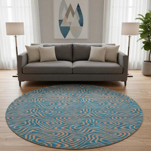 HomeRoots 8' Teal and Peach Abstract Washable Round Rug - Durable, UV-Protected, Perfect for Family Spaces! 680990