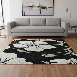 HomeRoots 5' X 8' Black and Ivory Floral Area Rug - Washable, UV Protected, Durable Design for High-Traffic Homes 681013